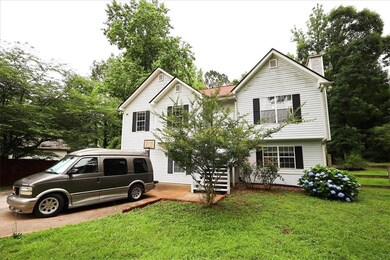 View of front of property with a chimney