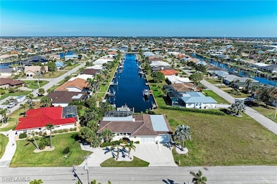 Aerial view with a residential view and a water vi