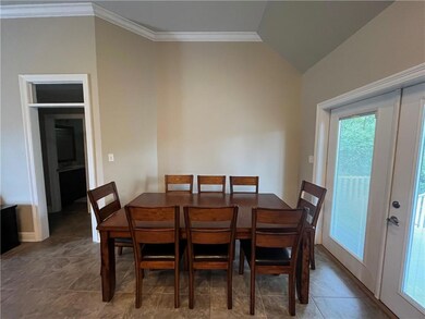 View of the dining with doors to the patio