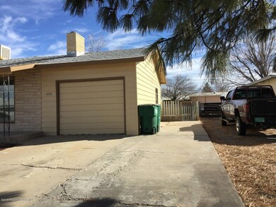 Side entrance to yard