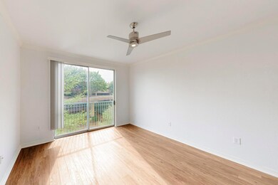 Unfurnished room with light wood-type flooring, ce