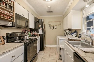Kitchen. 3 Bedroom Unit. Refrigerator included in 