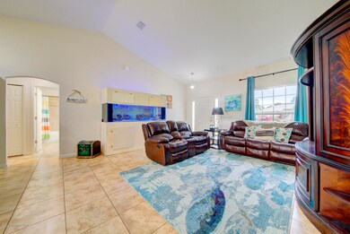 living room with vaulted ceiling
