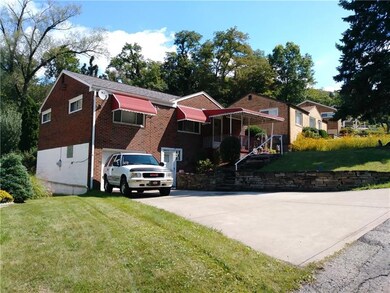 Wide driveway for additional off street parking.