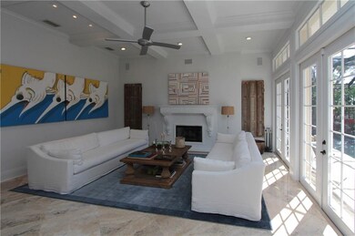 Family Room With Fireplace - French Doors Leading 
