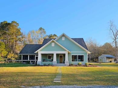 View of front of property with a porch and a front