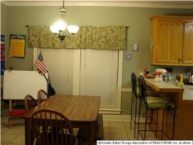 The Breakfast area is very spacious, with tiled fl