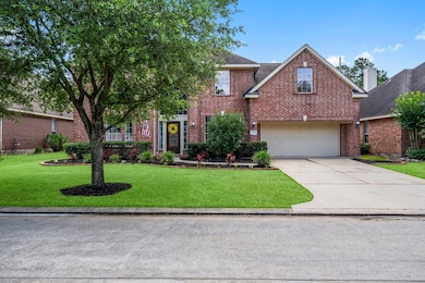 Situated on a neatly landscaped lot in a well esta