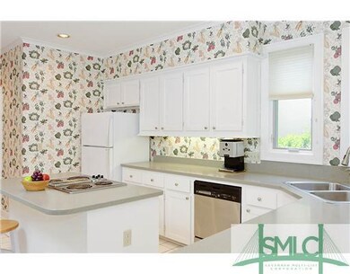 Kitchen. The center island and corner sinks and lo