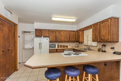 Spacious Kitchen with Backyard Views