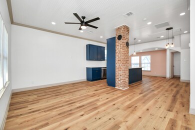 Open floor plan! Notice the charming beadboard cei