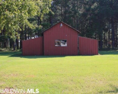 Old barn has a bath & possible living area plus a 