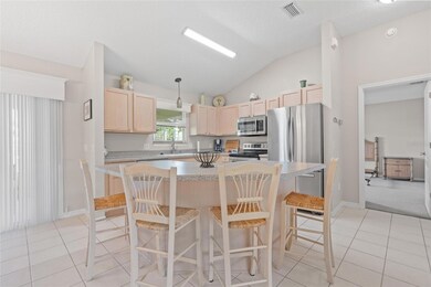 Center island type counter makes a perfect spot for your morning coffee, as well as entertaining guests.