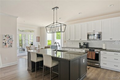 Kitchen with light LVP, stainless steel appliances