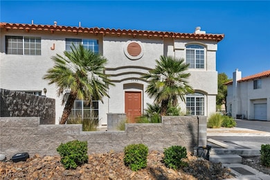 Mediterranean / spanish home with stucco siding an