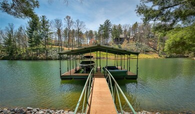 Double slip covered dock with lift. Easy access, d