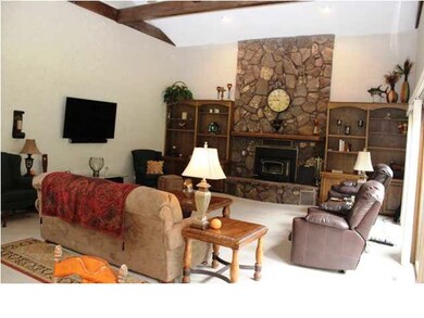 GREAT ROOM WITH 18 FEET VAULTED AND BEAMED CEILING