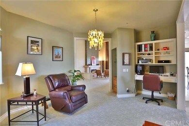 Separate den  with  built in desk and bookcases.