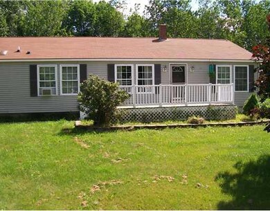 Exterior Front. Large front deck