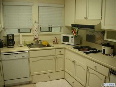 Kitchen with solar tube lighting.  No lights are t