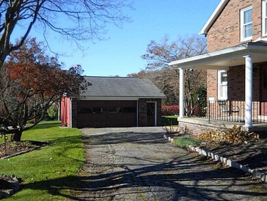Parking Lot/Garage. 2 car detached garage with att