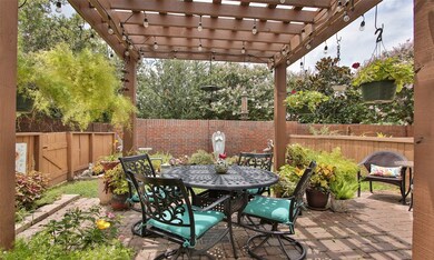 Pergola, patio pavers and professional landscaping