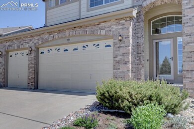 Garage with concrete driveway