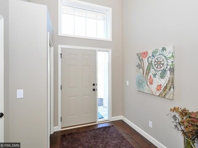 Foyer. Photo of another home with similar finishes