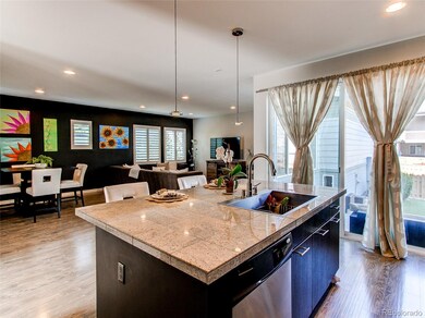 Kitchen opens to patio and living/dining area