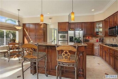Sunny and spacious kitchen boasts new maple cabine
