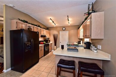 Kitchen with tile floors.