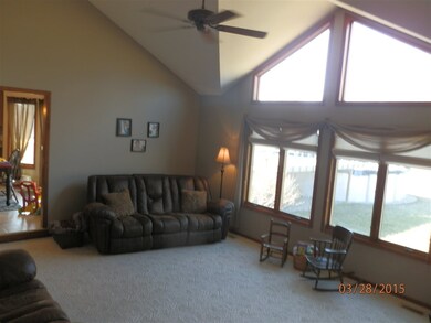 Vaulted ceiling - great back yard view.
