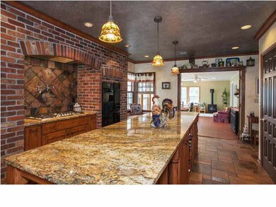 An alternate view of the kitchen shows its attachm