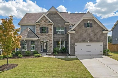 View of front of property featuring a front yard a