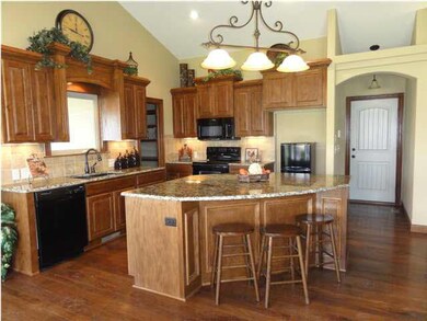 Staggered cabinets and walk-in pantry.