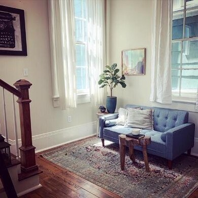 Staged  Living-area off of kitchen/ dining area.
