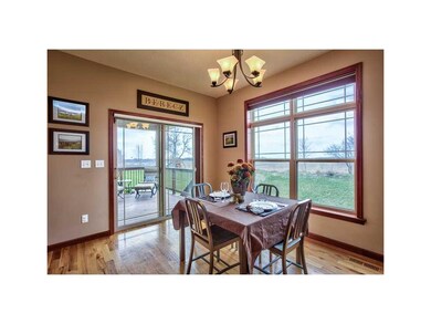 Dining Area. DESIGNER WOOD FLOORING.