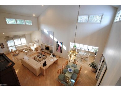 View of the first floor from second floor loft. No