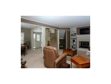 Great Room with a fireplace and open floor plan.