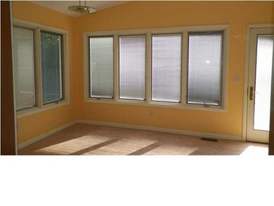 Bonus sun room with Pella windows and built in min