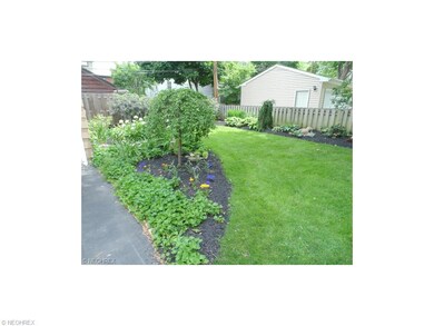 Beautifully landscaped rear yard that not too much