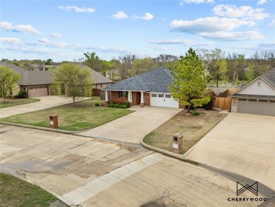 View of front of home featuring roof with shingles