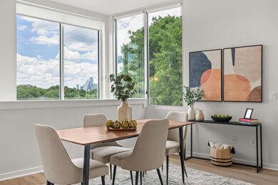 Dining area featuring plenty of natural light, li