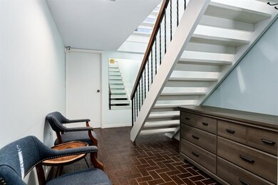 Large welcoming entry with a closet and drop zone
