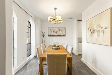Dining space with a notable chandelier