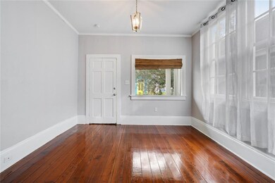 1116 living room with newly finished hardwood floo