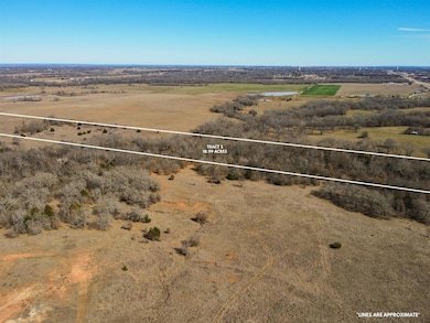 Overview of rural landscape with property parcel outlined
