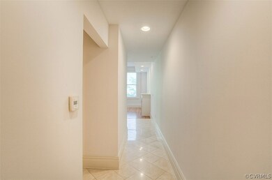 Entrance Hall; Half bathroom and Master Bedroom en