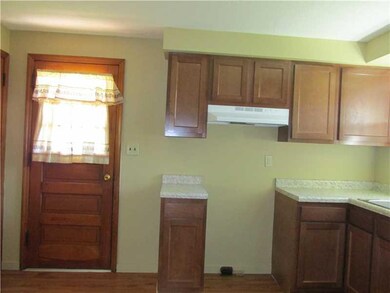 Kitchen. view showing the kitchen door on the side