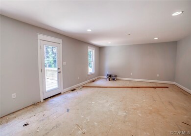 Huge Great Room with Full light door to rear deck.